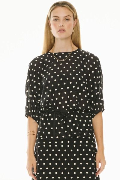 Made from cotton voile with white embroidered polkadots, the Clove Embroidered Top is an elevated take on a tee shape perfect for dressing up or down. style pp5705.