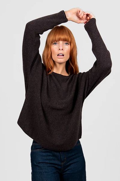 Experience effortless style and comfort with the Dolman Rib Pullover, a modern knitwear essential that elevates your casual wardrobe with understated sophistication. This pullover features a relaxed dolman sleeve silhouette, providing roomy comfort while 