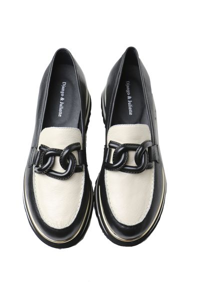 Go bold with these leather plaform loafers by Django and Juliette. EAILA transforms a traditional silhouette with a larger than life sole that elevates any outfit.
