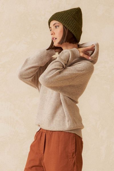 Easy Jumper for the season by Indi & Cold. The Hooded jumper in Wool Blend has drop shoulder sleeves  and keeps you cozy throughout. Style FG450.