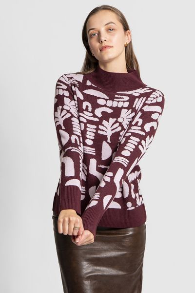 Add an exclusive touch to your knitwear wardrobe with our Jacquard Oversized Pullover, featuring a unique and exclusive artwork inspired jacquard pattern. Crafted from a luxurious blend of 50% wool and 50% acrylic, this pullover offers a remarkably soft a