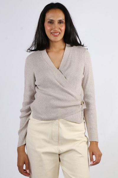 A perfect cardigan that gives you many styling options, this Wrap Cardi by Foil is a perfect one. In an easy cotton blend, the long sleeve cardi with a V neck can be styled front open or wrapped around with a button closure on the side. The Classic Ribbed