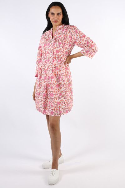 Fun times are calling and better dress up for the occassion in this Michigan Tuck Dress by Ibsa. In an overall floral block print, the cotton dress features pleated details and open neck. Falling above your knees, style with easy glads, slides or sneakers