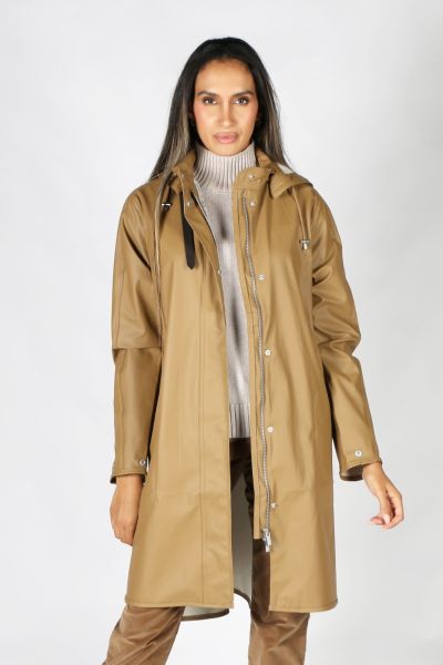 Image of a knee-length, black Ilse Jacobsen raincoat made from waterproof fabric. The coat features a front zip and button closure, a drawstring hood, and two large pockets at the hips. The coat has a flattering A-line shape and is ideal for keeping dry i