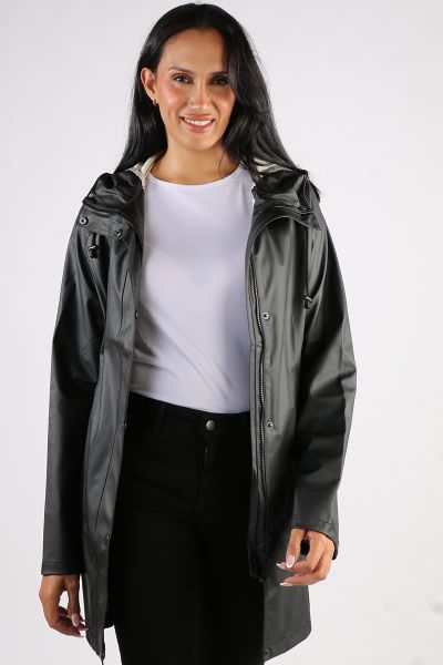 Image of a knee-length, black Ilse Jacobsen raincoat made from waterproof fabric. The coat features a front zip and button closure, a drawstring hood, and two large pockets at the hips. The coat has a flattering A-line shape and is ideal for keeping dry i