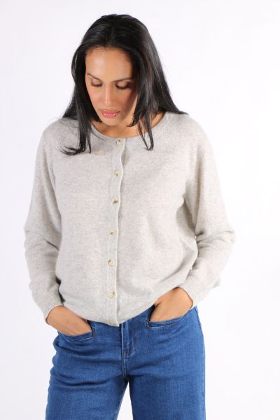 Classic button down Cardigan is a classic by Aldo Martin. In cashmere, the Abune Cardigan has a round neck, full sleeves and front button closure. Style it over dresses or separates alike.
