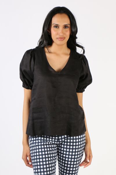 A linen top is a summer classic and this one by Jump ticks all the boxes. In a Washed Linen, the V neck top hugs you in all the right places and has short gathered sleeves. Style this top with easy pants or jeans for a breezy brunch look. Style 556J3007.
