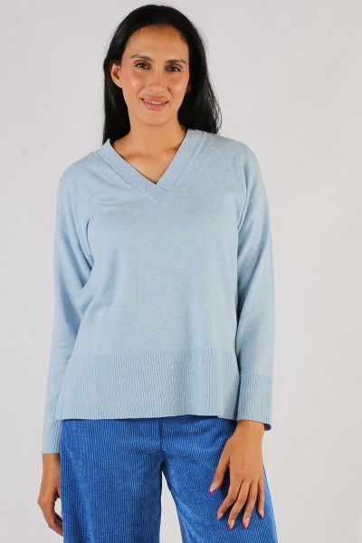 Step out in style this season in this jumper by Jump. In a cotton wool, the V neck jumper with long sleeves and a side split hem for easy movement. Finished with a ribbed cuffs and hem, style it with easy pants. Style 58611025A.

