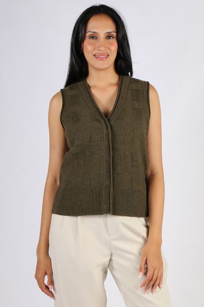 Easy Pippa Vest by Loobies story is a perfect go to for the season. In a 100% Merino, the sleeveless vest in a basket weave can be layered or worn on its own with your favourite pants or skirts. LSK2520.
