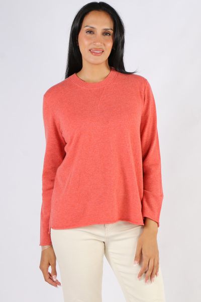 Soft and Cozy Juniper Jumper by Loobies story makes for a perfect staple. In a Cashmere blend, the easy cardi has a long sleeves, a high round neck and finished with side split hem for easy movement. Style with easy wide leg wool pants or skirts. Style 