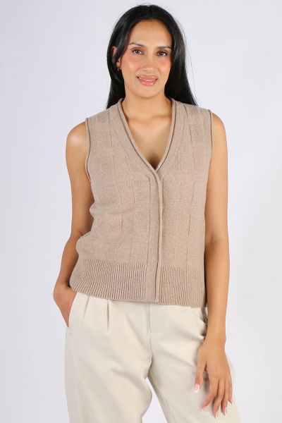 Easy Pippa Vest by Loobies story is a perfect go to for the season. In a 100% Merino, the sleeveless vest in a basket weave can be layered or worn on its own with your favourite pants or skirts. LSK2520.
