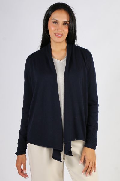 Go for a luxe vibe this season with this Cardigan by Loobies Story. In a Merino blend, this cardi has long sleeves, with a front open edge to edge drape. This cardi can be styled over basic separates and dresses. LSK2506.
