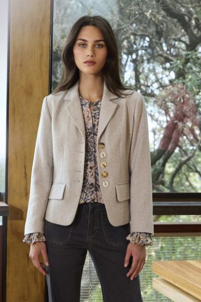 The Grove Jacket combines style and sophistication. Crafted in a wool blend fabrication in tones of neutrals, it features mismatched asymmetrical tortoiseshell buttons. A timeless wardrobe staple you will cherish for years. LA3702.