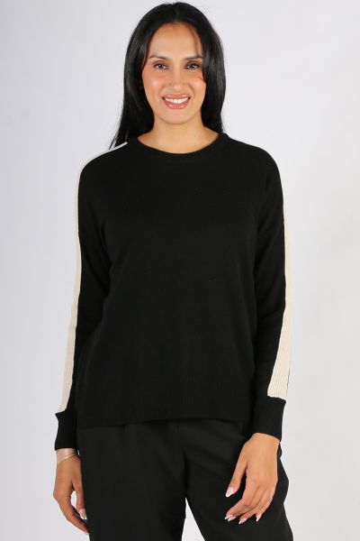 The Madly Sweetly Getaway Crew Sweater is a crew neck sweater with a dropped shoulder in a cashmere, merino blend. Featuring a contrast overarm rib panel, with side splits. MSK2512.
