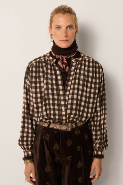 An easy but sleek shirt by Maison Hotel is just that little extra than your average shirt. The Rebecca Shirt in a Brush cotton, the checked shirt in Open neck and full sleeves. Style it with easy blazer and pants for an easy but elevated summer look.