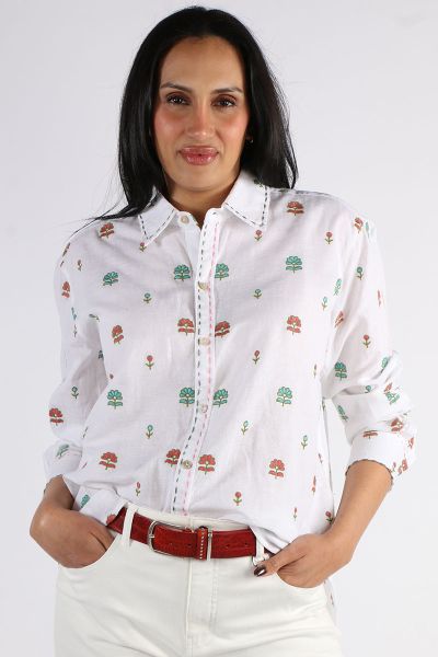 Your classic summer shirt gets a Mandalay Makeover this season in this Flower Shirt. The white linen shirt features an overall embroidered florals and stitched trim, classic collar and long sleeves. Style with easy cotton pants or denim shorts. Style 009.