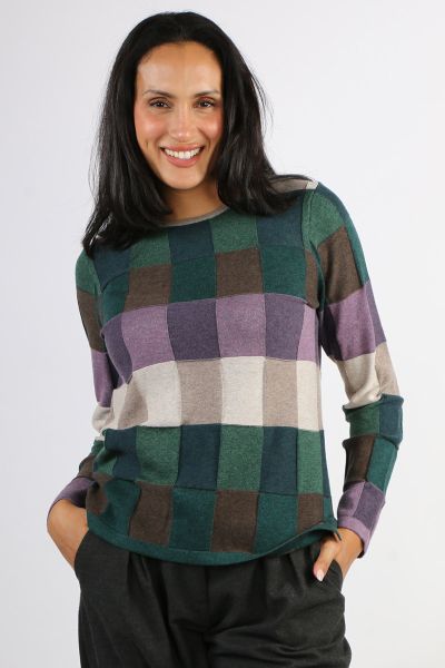 Playful and light, the Lillith Organic Cotton Sweater from Mansted brings bold, bright energy to your winter wardrobe. Featuring a round neckline, long sleeves and a multi tone check print, this soft cotton knit teases with texture, mastering a unique rai
