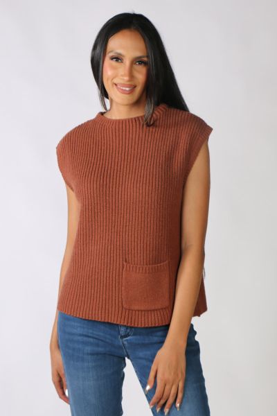 This chunky rib knitted vest from Marco Polo is a must have in your winter wardrobe! With a round neckline and drop shoulders it is the perfect layering piece. It is sleeveless and features a small front pocket and it made from a soft cotton blend. Style 