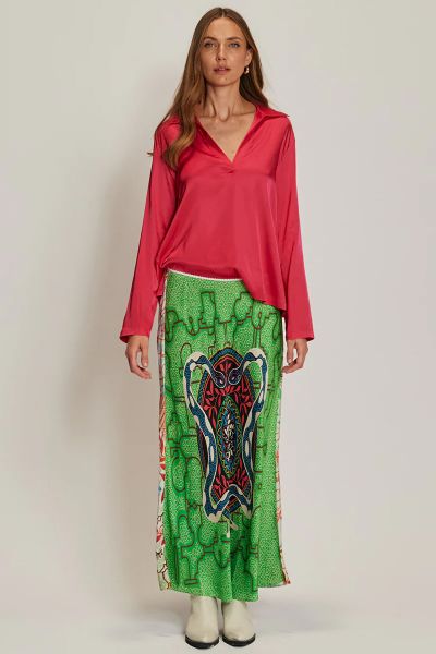 A vibrant take on the classic slip skirt, the Blakely is cut in a flowing maxi length with an elastic waistband for effortless comfort. Designed in a bold snake inspired Shipibo print, it makes a statement on its own or paired with the matching cami.
