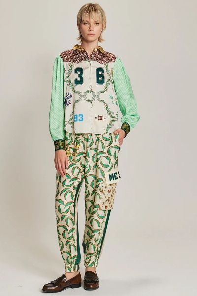 Gianna cargo pants come in our Sporty Jade and Rodeo patterns. There are two side pockets and two large pockets at the knee. Elastic waist. The Sporty Jade pattern has a leaf motif on the front and stripes on the back. Pair with our Grace Shirt for a femi