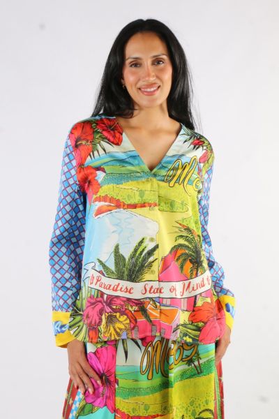 V-neck button down loose fitting top with long sleeves in our Twisted Love print. Hemline is rounded. Body of the shirt is a beautiful tropical landscape with flowers, palm trees and water. It says “Me” and “Paradise State of Mind”. Predominant colors are