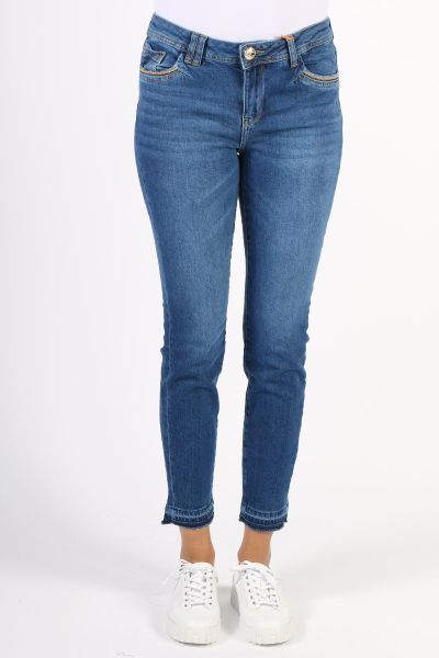 Mos Mosh Sumner Wood Blue Ankle Jeans, a classic blue skinny jean with a low rise waist and a raw unfinished hemline. Finished with the brand's signature embroidery and stud detailing on the front and back pockets the Sumner jean is a best seller. Cropped