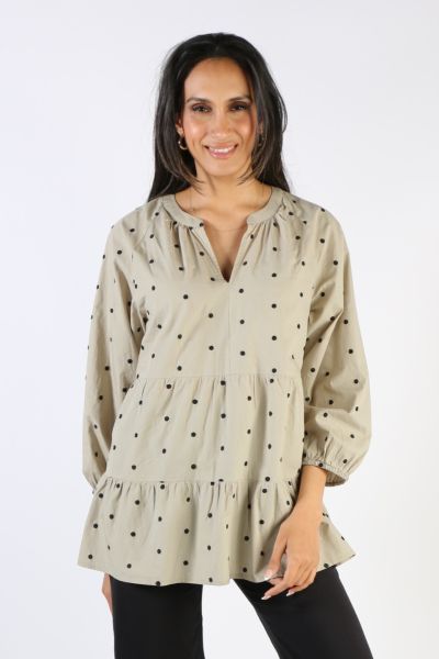 This lovely embroidered spot top effortlessly blends a boho chic shape with a classic navy and white spot. Made from a soft and breathable cotton voile, this blouse features a V-neckline, full length sleeves, a tiered bodice and embroidery detail. Perfect