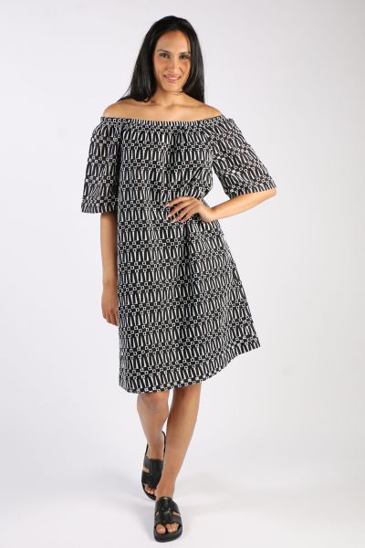 The Ping Pong Broderie Dress in Black and White is a classic choice This dress features intricate broderie detailing in a timeless black and white colour scheme. With a gathered elastic neckline that can be worn off shoulder or just as it, it has half sle