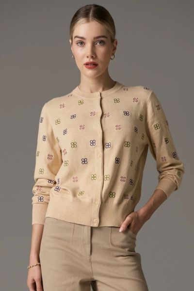 An easy layering piece that is perfect to elevate any look this season. The Pol Beech Cardigan is a cashmere blend cardi with a front button closure and embroidered all over details. With classic Round neck and full sleeves, style it over dresses and sepa