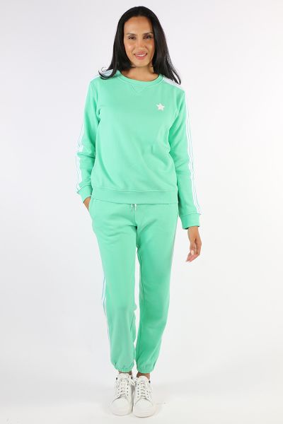 Indulge in the ultimate luxury of comfort with these new cuff track pants by Sophie Moran, meticulously crafted from garment dyed 100% cotton that we knit and dye for a uniquely soft finish. Designed for discerning comfort, these joggers feature an elegan