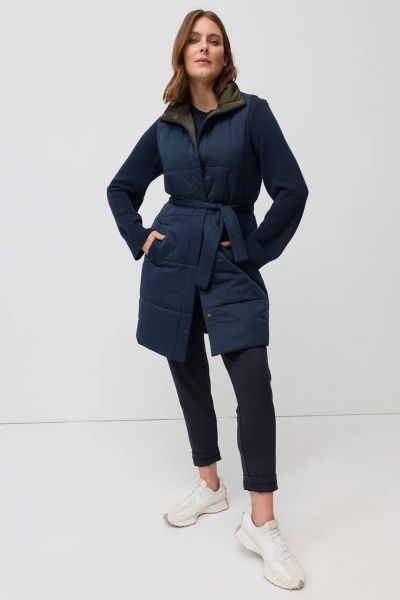 The Reversible Belted Vest is a versatile layering piece designed for warmth through the cooler months. Quilted for a modern puffer inspired look, it features a sleeveless cut, press stud front and a matching waist tie that can be cinched to shape the sil