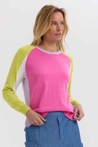 This exquisite baseball jumper is crafted from a luxurious blend of soft cotton and delicate silk, offering both comfort and elegance. It features a stylish crew neckline. Where the colour of the left underarm subtly hints at the vibrant hue of the back, 