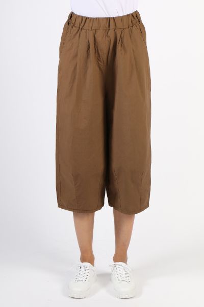 A breathable cotton pant should be a must have in every wardrobe and these are a perfect choice. With an elastic waist and a cropped bottom, these are essential to build any summer outfit. Pair these with a flowy cotton top for a cool and sophisticated of