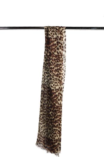 Wrap yourself in warmth and elegance with the Animal Print Fine Merino Silk Designer Scarf in a captivating brown hue. Designed for winter, this luxurious scarf combines the wild beauty of animal prints with the softness of premium materials for a sophist