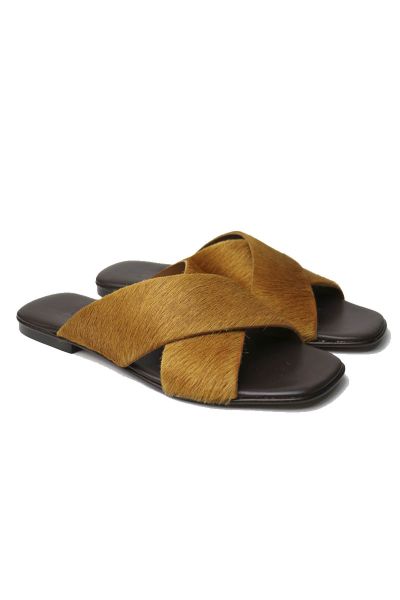 Meet your new go-to sandal, made with soft pony hair for a sophisticated take on the summer sandal. Easy sandal with pony hair upper with lightly padded leather insole. Style 2309.
