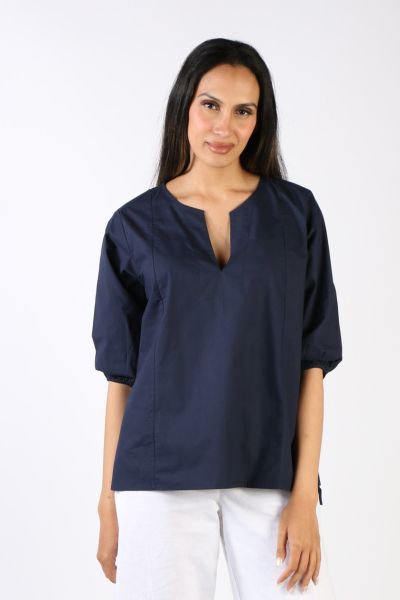 Go for easy vibes this season in this Elka top by Bagruu. In a round split neck and a panelled design, the top has peasant sleeves and can be styled with easy pants for a perfect day to night look. 