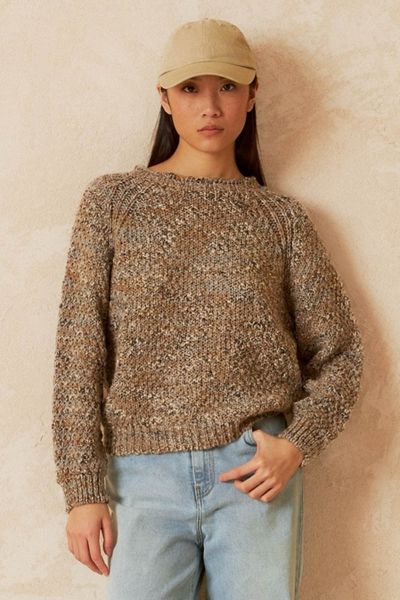 This knitted sweater features a round neck, dropped shoulders, and a straight fit that slightly hugs the body. The knit fabric is worked in a basket weave with yarns of different colors. If you want it to be more oversized, go for one size larger. 