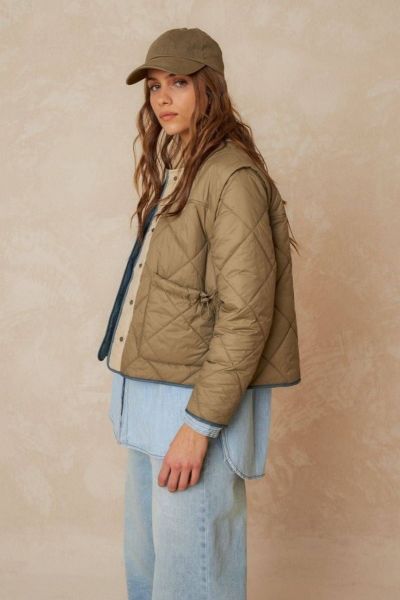 Winter warmth two ways with Indi & Colds multi style vest & jacket. Simply zip off the sleeves with the hidden zipper & reveal a quilted vest. The ultimate in versatility! style GF706.