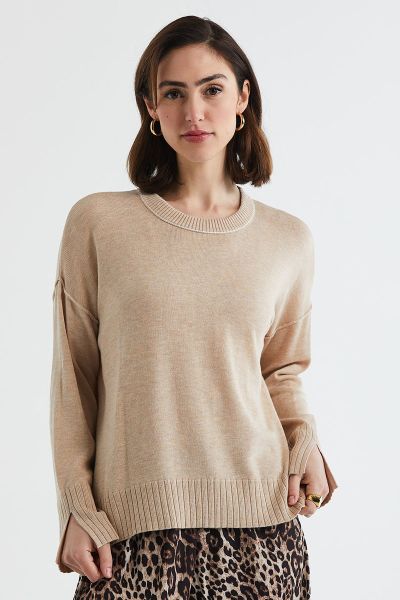 An easy and relaxed jumper is the order of the day and this one by Ld and Co. In an easy fit the jumper has a crew neck, long sleeves with a split and is finished with ribbed trims at hem, cuff and neckline. Style is with easy wool pants. LC7161.
