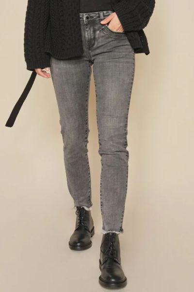 These sleek jeans are designed in a slim fit with a low rise with rock n roll coolness. Adorned with studs at the pockets and a raw bottom hem at the front, they exude a lived in edgy feel. To balance the look, pair them with a feminine boho inspired blou