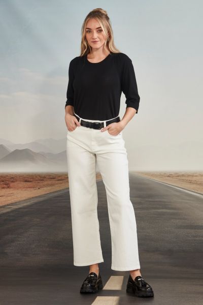 Embrace the relaxed sophistication of a perfectly tailored wide leg jean. 5 pocket, fly front, wide leg jean in soft, stretch white denim. The Cruise jean is ankle length. style 9594XBT.