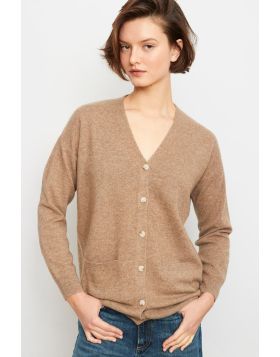 This soft and relaxed classic V neck cardigan is sure to become a winter favourite. So versatile and so soft and warm, it looks just as good with jeans as it does over a skirt or dress for casual winter style. Knitted from high quality cashmere, with butt