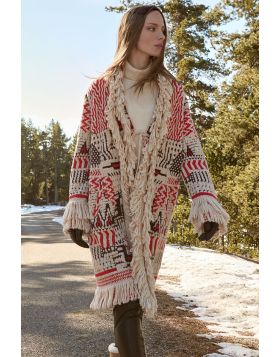 The Aldo Martins Calar Wool Coat is a handcrafted knit piece that combines design, warmth, and character in a single stylish statement. Its high quality wool blend fabric features an original geometric pattern in ecru, red, and black, creating a vibrant c