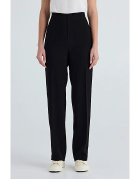 Elevate your style with the Athena Pant, crafted from a luxe acetate blend. These wide leg pants feature an elasticated waistband and functional pockets, making them a versatile choice. For a polished outfit pair with the easy shirts and Athena Jacket. LA
