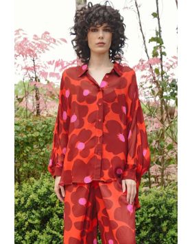 A wide cut silhouette defines the BEHIND HER BACK Shirt, offering an effortlessly relaxed drape. Crafted in CHARGED UP CHERRY viscose georgette, this button through style features soft batwing sleeves, creating fluid movement through the shape.CT255009.

