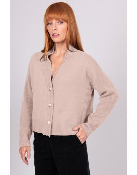 A Boxy fit relaxed cardigan with ribbed shawl collar and detailed, cable panel feature. Dropped shoulders for an easy to wear, relaxed look. High hip length. The collar can be worn high or folded for a roll collar effect. Horn-look buttons for a stylish f