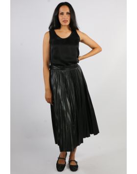 Elevate your style with the Florence Pleat Skirt, a timeless piece that effortlessly blends elegance and edge. Crafted from a soft faux leather fabric, this skirt features finely pressed pleats that create beautiful movement with every step. The midi leng