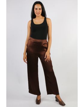 Sleek, fluid, and sophisticated, the Opera Wide Leg Pant brings effortless glamour to any occasion. Crafted from a soft satin fabric with a beautiful drape and subtle sheen, these pants offer a high rise fit and a relaxed wide leg silhouette that flatters