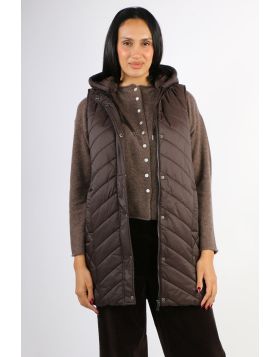 Introducing the Longline Vest, the versatile piece of outwear you will be reaching for this season. Detachable hood with grosgrain tie, Concealed front zip with snap button closure , Lightweight, Side zips. Its longline shape is perfect for when you are o