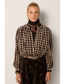 An easy but sleek shirt by Maison Hotel is just that little extra than your average shirt. The Rebecca Shirt in a Brush cotton, the checked shirt in Open neck and full sleeves. Style it with easy blazer and pants for an easy but elevated summer look.